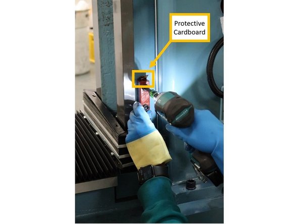 Jog the head all the way up on the Z-Axis, and ensure that the designated holes for the support blocks on both sides of the Z Way Surface are completely visible and unobstructed.
