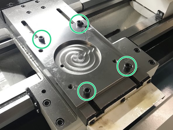 Attach turret mounting base to cross slide using the supplied M10 hardware and M10 T-slot nuts. Torque to 27ft/lbs.