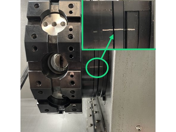 The tool disk is adjusted when the turret is at the T1 (origin) station with the disk aligned with the alignment mark lines