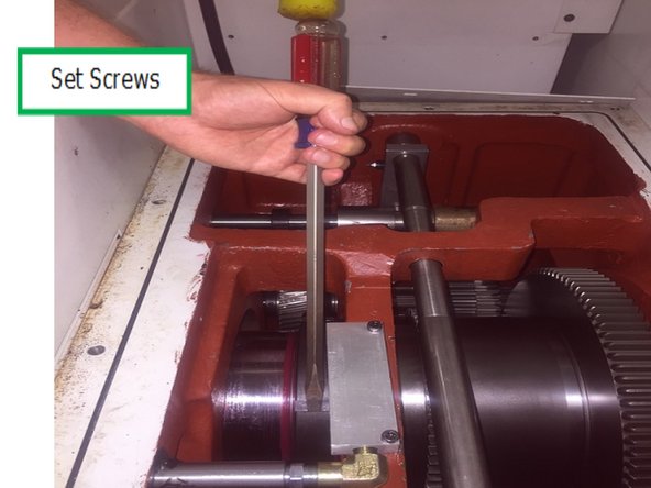 Note: You may not be able to tighten the set screws at this time because the spindle can’t be rotated due to it being mounted in the spindle removal tool.