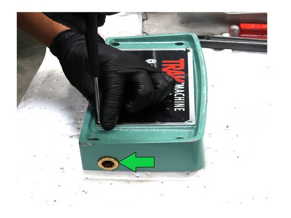 Install the new front nameplate P/N 23965-1 using the old screws. Punch out original plug from the rear and replace with plug P/N 24164.