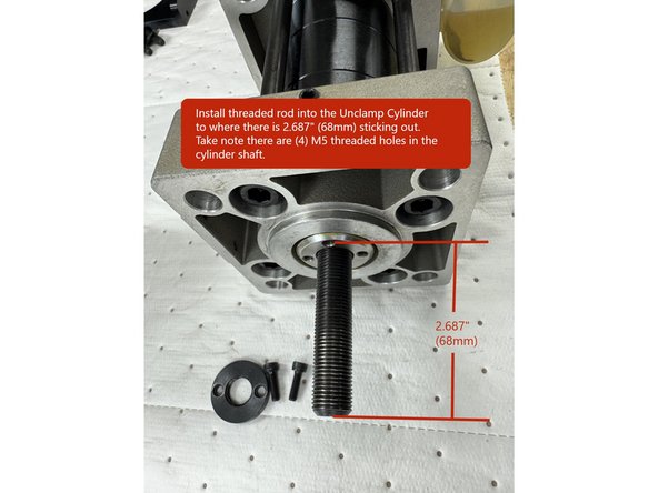 To remove the threaded rod from the Unclamp Cylinder, remove the (2) M5 SHCS and loosen the locknut. Then remove the threaded rod. The threads are left hand threads.