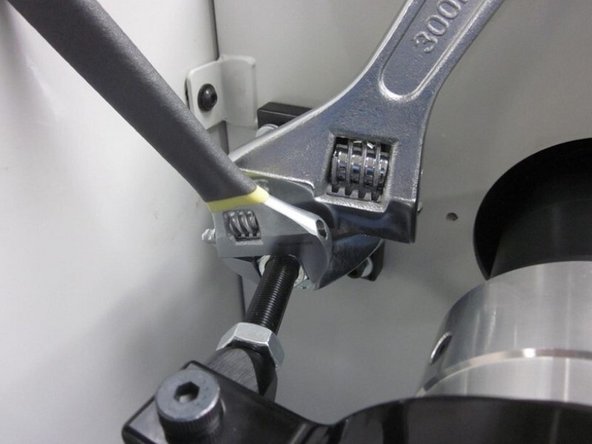 Engage the collet closer. Starting from the linkage connected to the handle, working towards the head stock, begin tightening all the screws and nuts a little at a time.  Be sure to hold the clevis with a wrench when tightening the nuts on the threaded rod to prevent any twisting and binding.