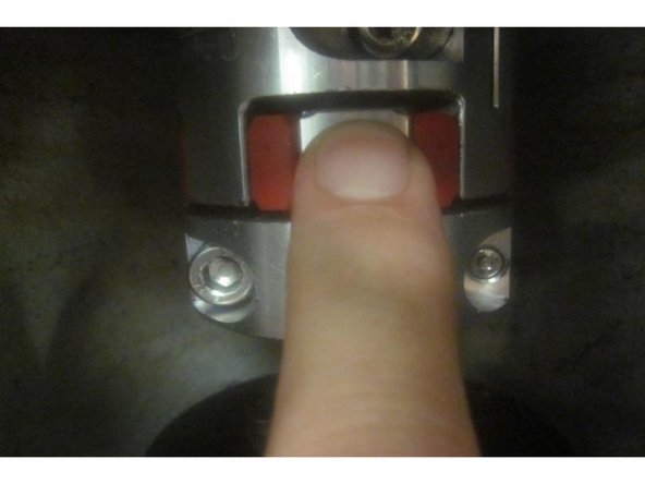 Install a zip tie around the upper clamp / unclamp switch to activate it. In DRO set the spindle speed at 500 RPM. Turn on the spindle and listen for noise. Gradually raise the RPM observing and listening for noise or vibration. Use care around moving parts.