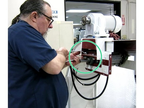 The next three steps (#13, #14 and #15) are how to adjust the belt tension, the chain tension and reassemble the Betake conveyor, for instructions on the Fongex conveyor skip to step #16.