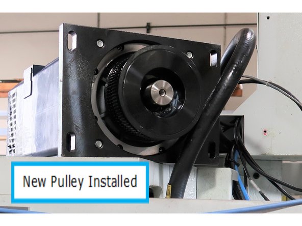 New pulley with tapered bushing shown (inset), also shows the larger size of the new pulley. Slide larger pulley onto the motor shaft. The tapered bushing holds onto the shaft and securing the pulley bore.