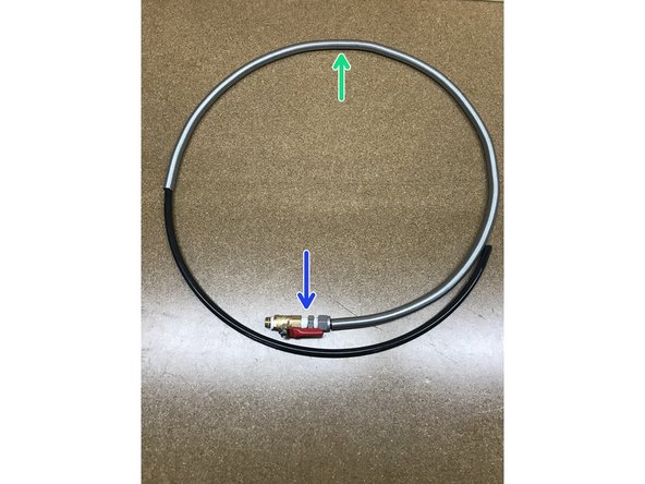 Add wire coil cover to coolant hose (turret to coolant manifold).