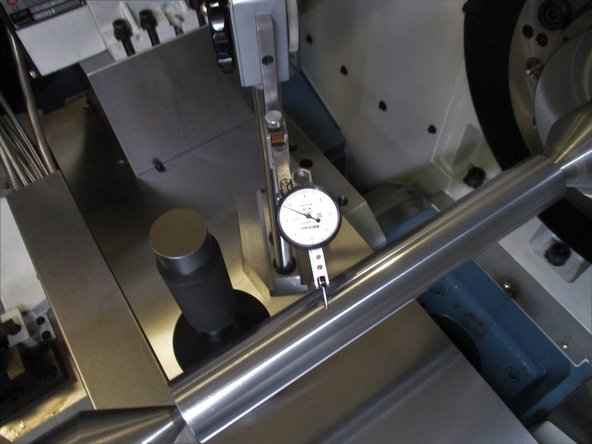 Using height gauge, measure the top of the arbor.