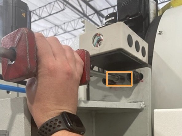 Set up the Slide Hammer with an M6 Bolt that will be used for removing the pins holding the ATC bracket and assembly.