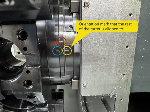 Set the turret to the number one tool location. Verify the alignment marks are lined up. If one or both of the alignment marks are out of alignment with the mark on the right side, the turret will need to be aligned. (photo shows alignment marks in line with each other) See Photo 1