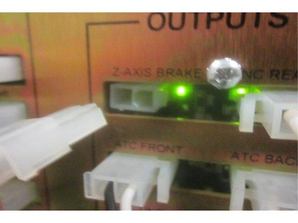 If powered up, home the machine.