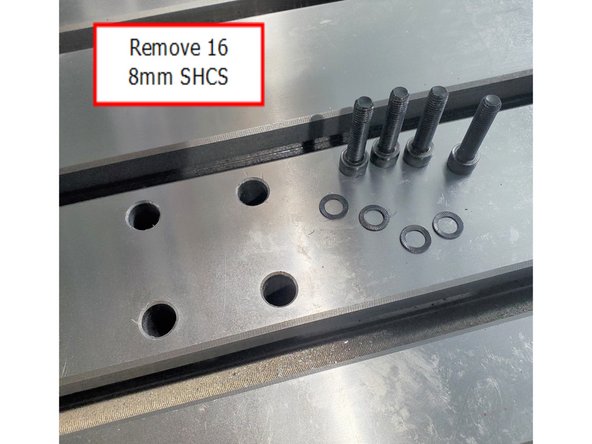 Remove (16) 8mm SHCS and serrated washers from all 4 Bearing Blocks.