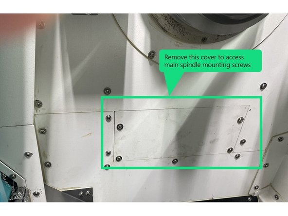 To access the adjustment and mounting screws on the front side of the machine remove the cover shown in photo 1.