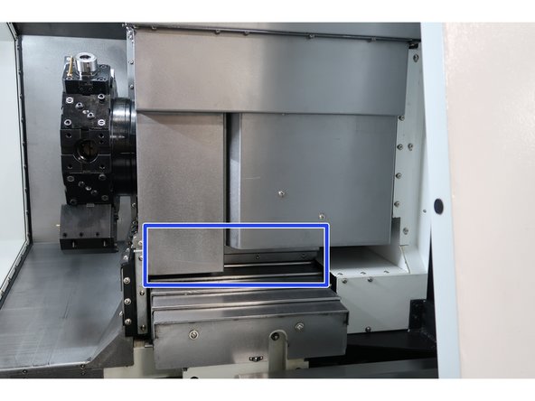 The area needing access is highlighted in blue. The following steps reference this area once the covers have been removed: