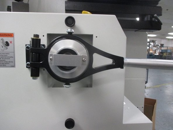 Tighten the SHCS on each clevis such that when a hex key wrench is inserted, the screw can rotate but does not have any upward or downward play.