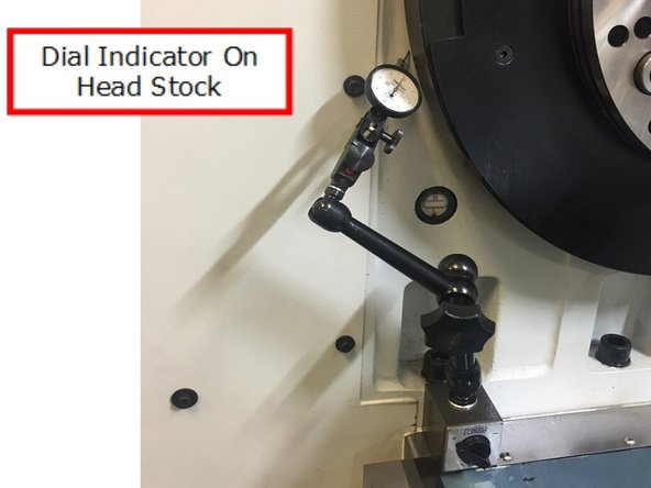 Set up a .0001” dial indicator on the front of the head stock casting. We want to see if the head stock casting flexes during the preloading process and we want to verify that when we release the tail stock that the casting flex, if any, returns to zero.