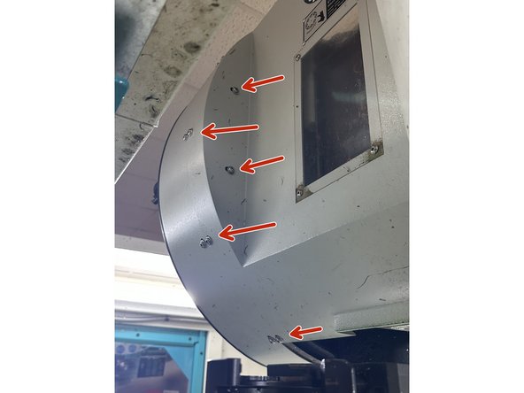 Reinstall the gearbox cover and secure it with its seven hex socket screws.