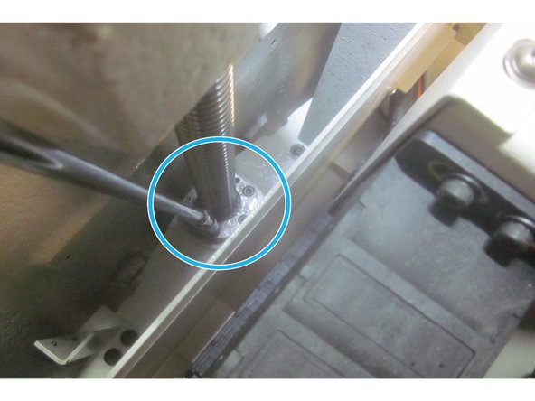 Carefully fit the assembled upper bearing housing onto the end of the ball screw. Lube the threads and install the clamp nut. Torque it to 50 ft. lbs. and the lock screw to 60 in. lbs. Install the lower bearing. It is a precision fit and may require a light &quot;tap&quot; to seat it against the shoulder on the ball screw.