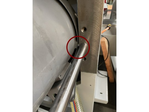 Slowly pull the motor out on the removal rods. Keep an eye on the electrical box, you may need to rotate the motor slightly to get it to clear the casting. You may also need to rotate the motor to clear the screw heads on the motor end cover.