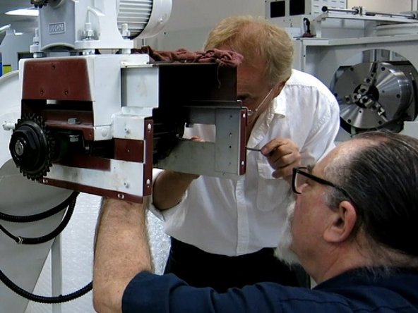 It is helpful to insert an M4 Allen key into one of the master pin loops in the belt to aid in pulling the slack out of the belt and installing it onto the lower half of the drive sprocket. Install the short end of the Allen wrench into the loop and use the long end like a handle to assist in pulling the belt to remove the slack.