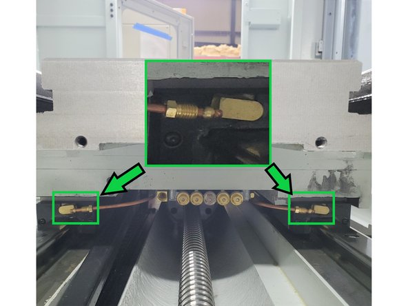 Torque all (16) M8 bolts to 25 ft.-lbs. Re-install the copper lube lines to each bearing block. Re-install energy chain bolts. Re-install 6mm nylon lube line to manifold. Carefully slide table up against the Ball Screw flange nut.