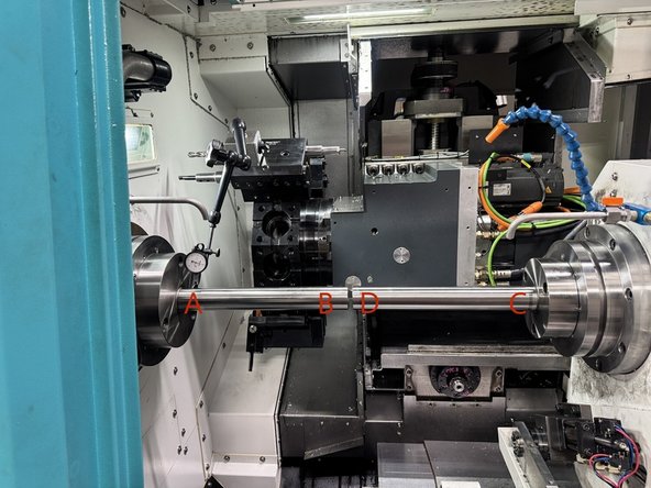 Set the indicator to measure the horizontal accuracy (side of test bar). Zero the indicator closest to the Main spindle face at Position A and move the Z1 Axis (turret) to positions B, D and C to measure the horizontal accuracy. This should measure no more than 0.0006" (0.015mm).