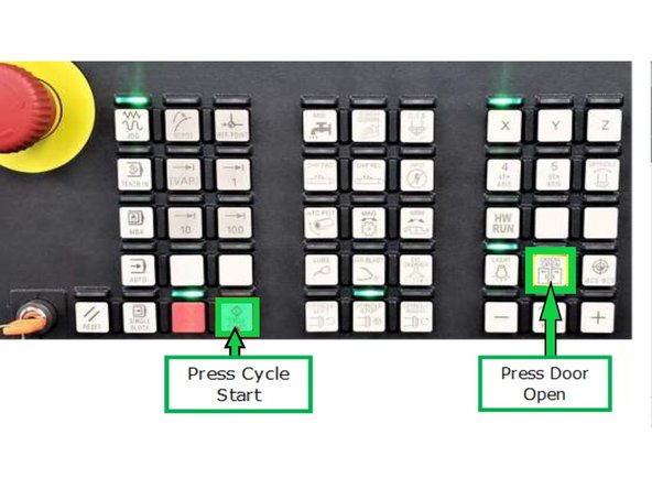 Press [DOOR OPEN] to unlock the machine door.