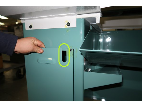 Both the coolant line and the power lines leave the coolant area through the slotted opening at the top of the cover.