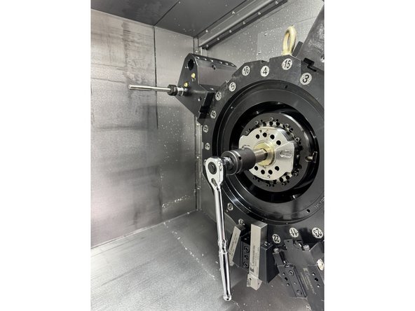 To loosen the turret mounting screws located behind the gearhead you will need a long 8mm or 5/16" Hex Drive Bit and a ratchet to access the screws through the gearhead access holes. The gearhead will need to be rotated 360 degrees to access all of the screws.