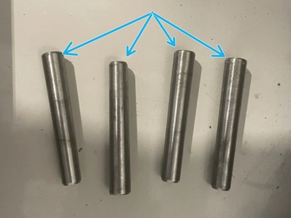 Thread the M6 Bolt on the Slide Hammer into the pins on the ATC bracket and the ATC assembly, then slide the handle, with force, away from the pins to remove them.
