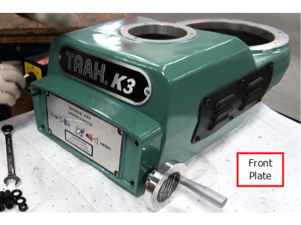 Remove front plate and retain the screws.