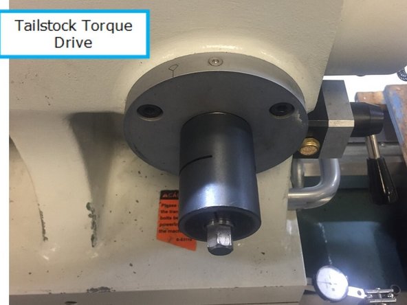 Install 32009 tailstock torque drive tool as shown in photo.