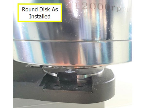 Inset photo shows the notch on the arm that needs to align with the shallow side of the disc. Make sure that the notch rests on the shallow slot of the round disc.