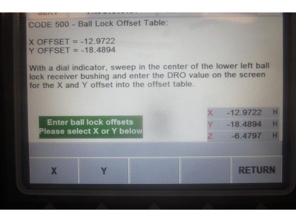 Go to service code 500. Using the co-axial indicator, sweep in the front LH ball lock location with the X and Y axis.