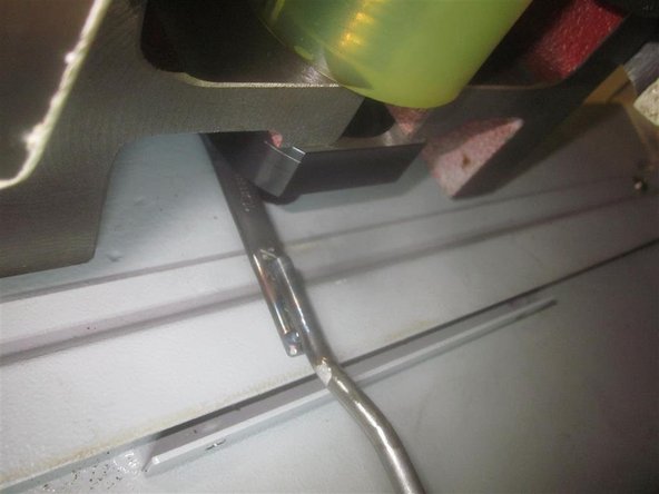 Lube all fasteners. Install the rear bearing housing. It may be necessary to wiggle it a bit to align the spacer. Install two screws in the upper holes, and snug them up. Install the clamp nut (lubed) and torque to 50 ft.-lbs. Torque the clamp nut lock screw (lubed) to 60 in.-lbs. Install the lower bearing housing screws, and snug them up.