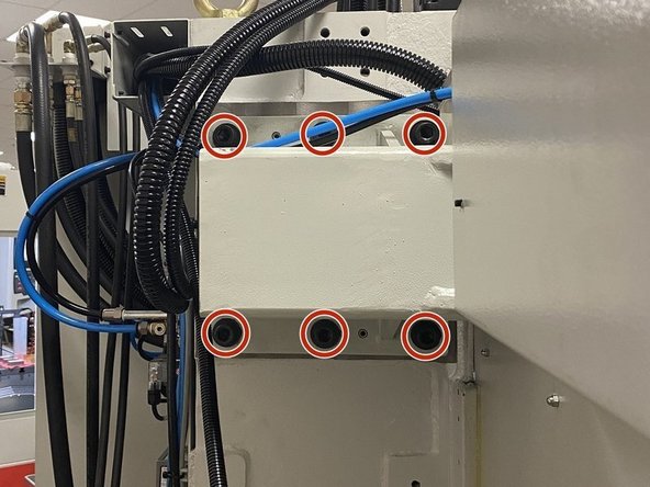 To adjust the ATC in the Y Axis you will need to loosen the six (6) screws securing the ATC adapter to the column casting. Loosen the mounting screws but keep them snug.