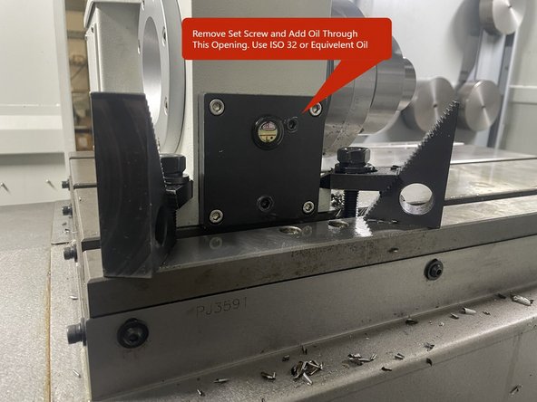 Once the backlash has been set, reinstall the black plate with the oil level indicator in it.
