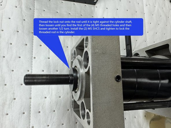 When installing the new threaded rod into the unclamp cylinder apply Blue Loctite 243 on the end of the rod that goes into the cylinder. Thread the rod into the cylinder to where there is 2.687" (68mm) sticking out.