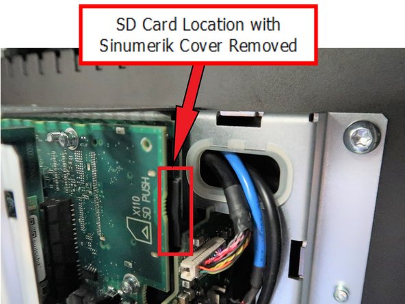 The SD card is located on the top right behind the plastic cover.