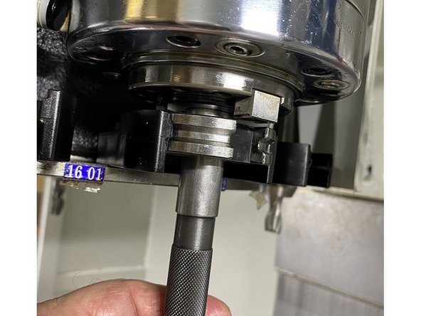 Ensure the carousel is under the spindle and the taper and ring tools are installed, and slowly lower the spindle until it is just above the ring tool. Insert the gauge pin into the ring tool , if the ATC is properly aligned the gauge pin should slide easily through the ring tool and into the taper tool with little to no resistance.