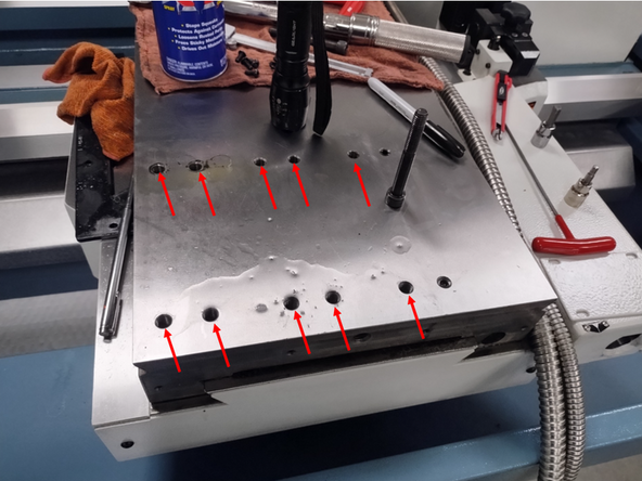 Check threaded holes prior to turret base installation