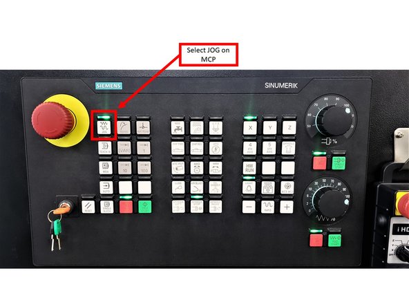 On the Machine Control Panel (MCP), press [JOG].