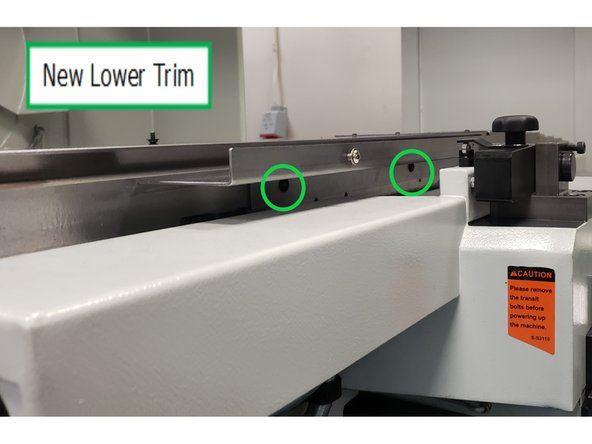 Replace it with the shorter of the two cross slide sheet metal parts provided. Detail shows two screws are installed on the bottom. The outside edge gets three screws to eventually connect with the upper cross slide sheet metal.