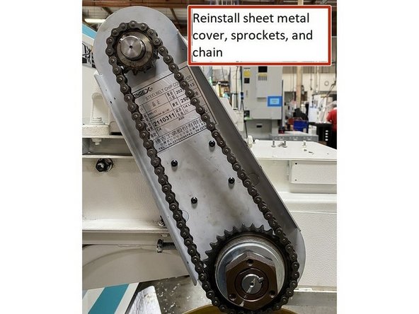 Now that the belt tension has been set reinstall the sheet metal cover that goes behind the motor and drive sprockets. Next reinstall the drive and motor sprockets and woodruff keys to the drive and motor shafts respectively.