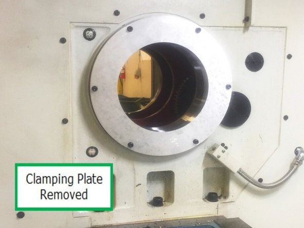 Remove front bearing race from freezer and install in the casting. Use 31099 clamping plate and (6x) M8x30 SHCS and washer to seat race and hold in place for at least 10 minutes while the race comes back up to room temp.