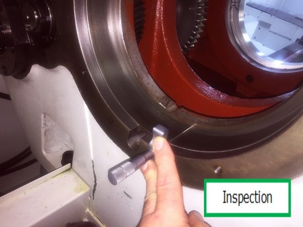 Loosely thread (2X) 5/8-11 x12 HHCS to attach 31093-1 bearing pulley separator halves. This can now be slid onto spindle and laid over front bearing. Thread in HHCS but allow bearing puller to rotate on bearing. Install the 31093-2 crossbar and 31093-5 pullbar as used before on encoder pulley removal.