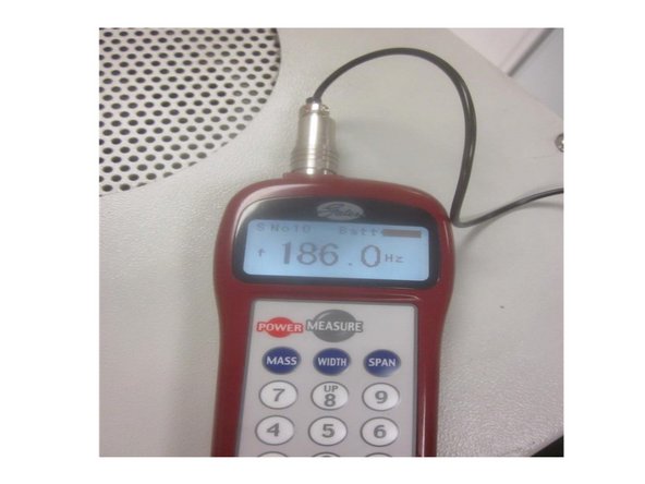 In service code 505, Use the hand wheel to adjust the Z index angle to 180 deg.  Install the belt, tension screw and all the mounting screws. Adjust the tension on the belt enough to only allow it to turn 45 deg.