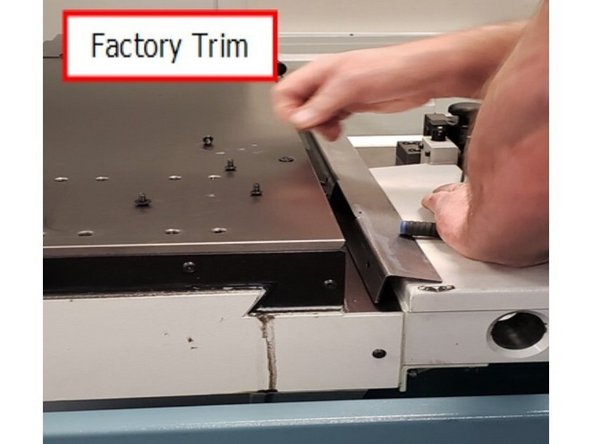 Remove factory trim from right side of table.