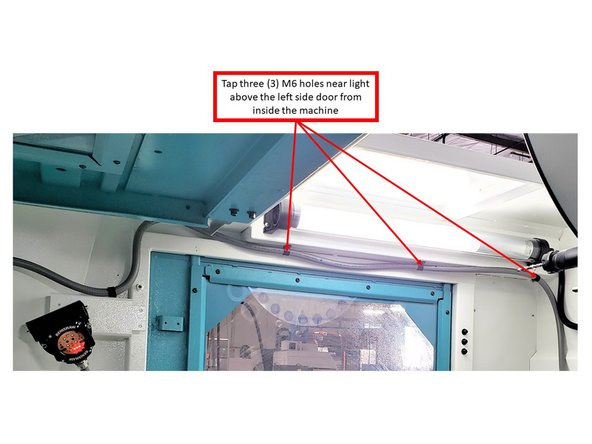 Tap three M6 holes on the front face of the same bracket, as shown in the image. The OMI-2T will mount here.
