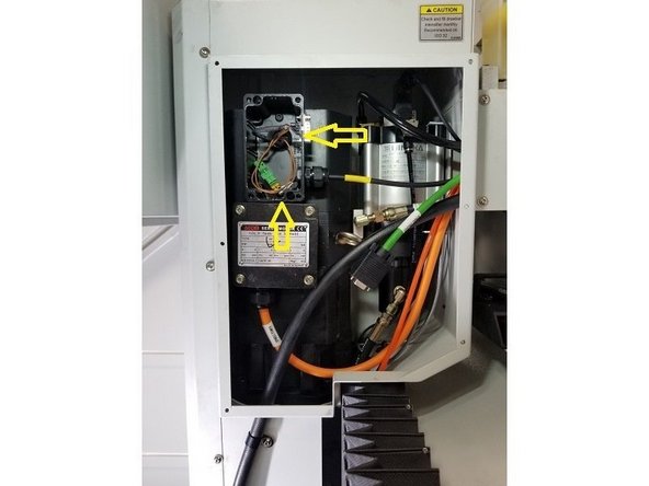 Connect up the Encoder Cable to the DB9 plug and install the service box cover. Install the Top Sheetmetal cover to the spindle motor. Install the RH side sheet metal cover for the electrical service boxes.